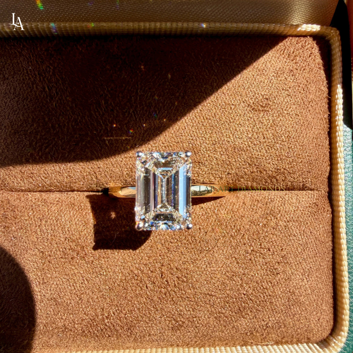 Emerald Cut Hidden Halo Engagement Ring