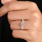 Round Cut Graduated Side Stone Engagement Ring