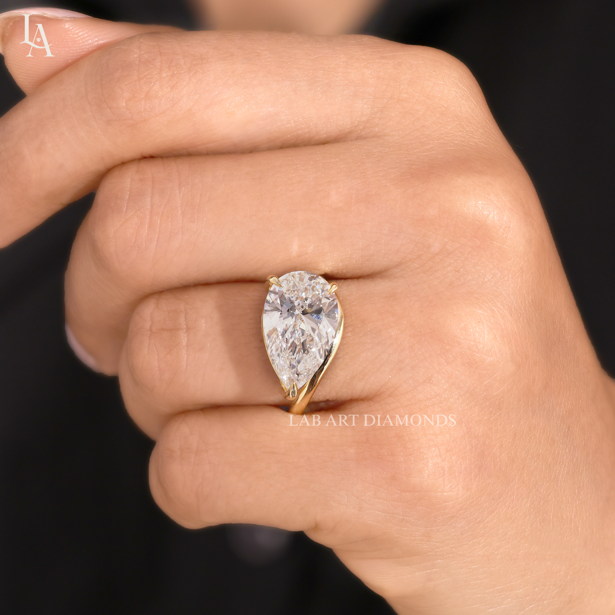 East West Pear Cut Solitaire Engagement Ring