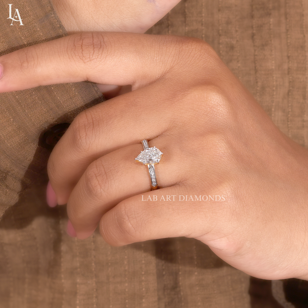 Pear Cut Tapered Pave Band Engagement Ring