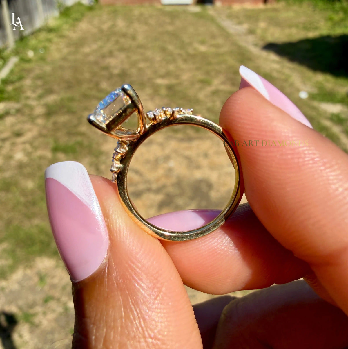 Emerald Cut Floral Side Stone Engagement Ring