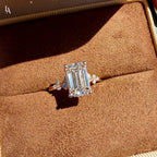 Emerald Cut Floral Side Stone Engagement Ring