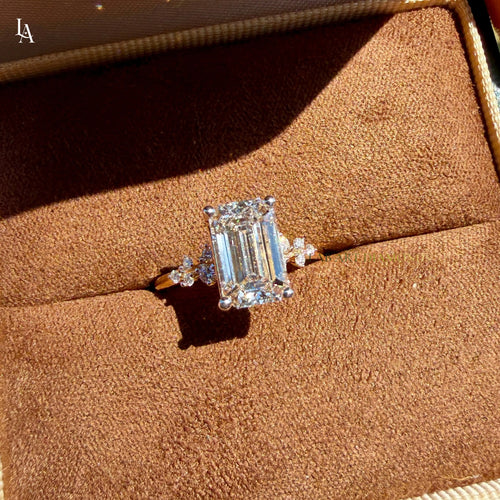 Emerald Cut Floral Side Stone Engagement Ring