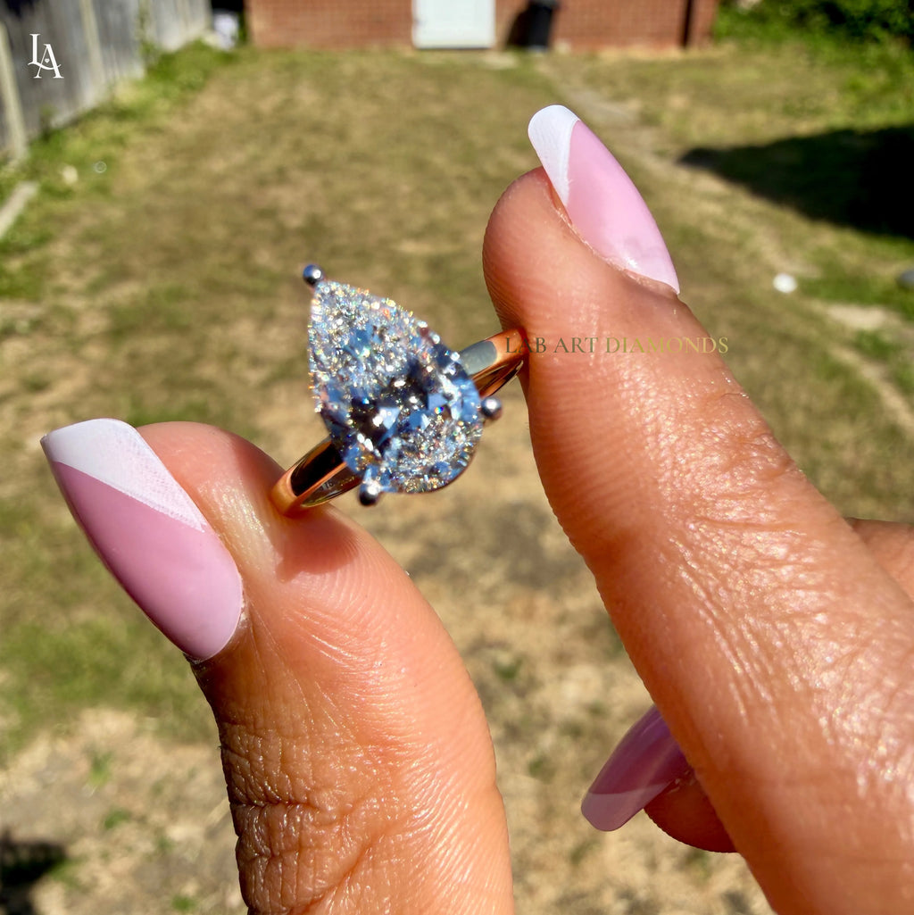 Pear Cut Solitaire Engagement Ring