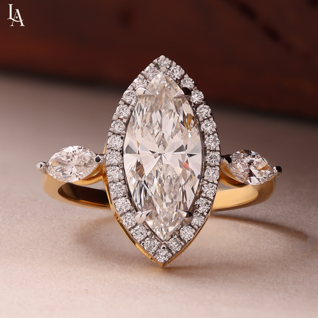 Marquise-Cut Three Stone Halo Engagement Ring