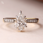 Pear Cut Tapered Pave Band Engagement Ring