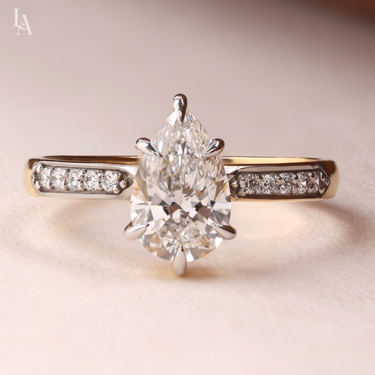 Pear Cut Tapered Pave Band Engagement Ring