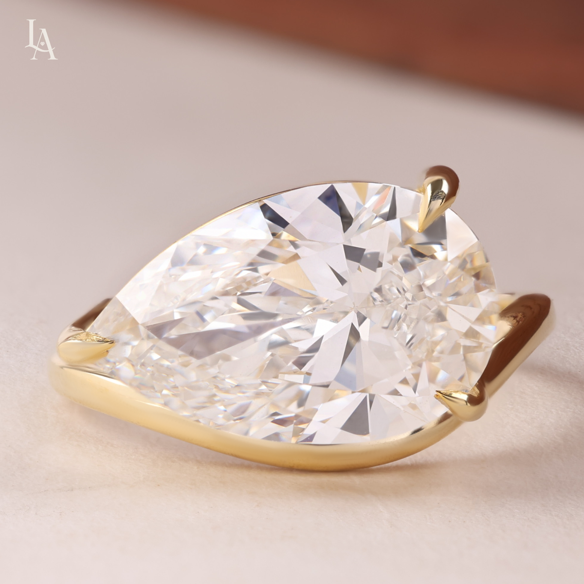 East West Pear Cut Solitaire Engagement Ring