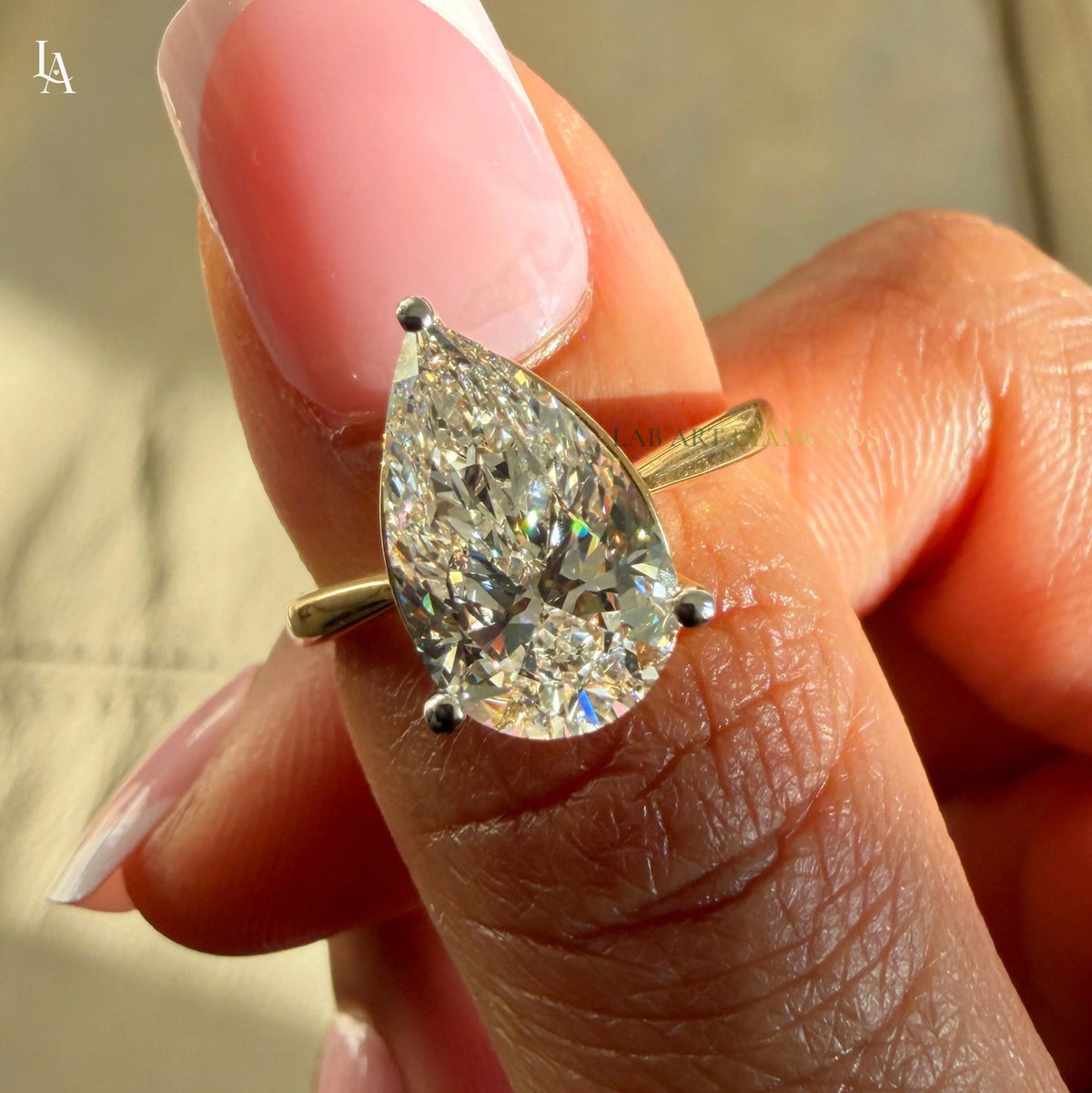 Pear Cut Solitaire Engagement Ring