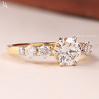 Round Cut Graduated Side Stone Engagement Ring