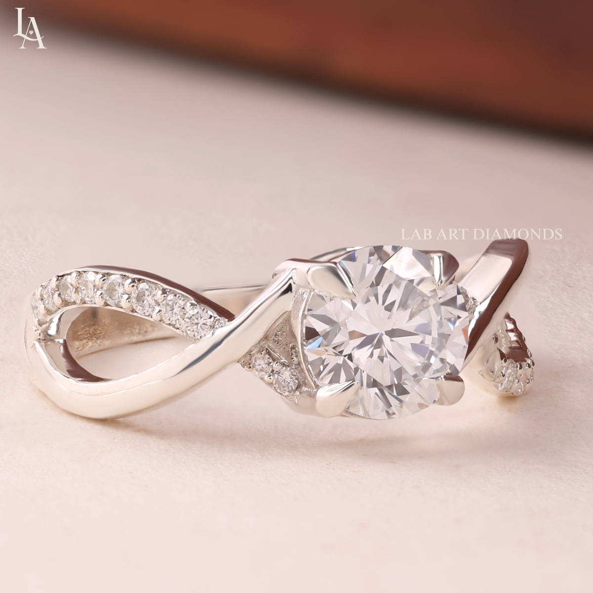 Round Cut Infinity Twist Engagement Ring