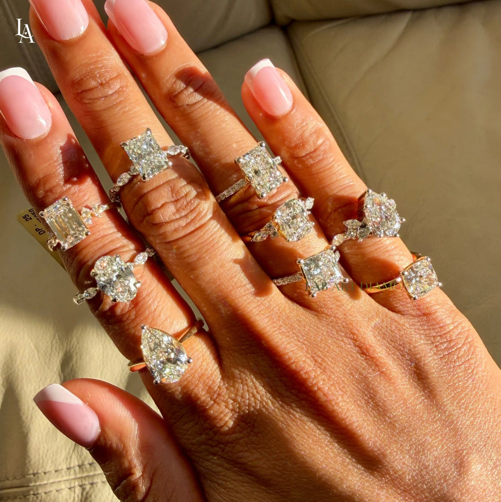 Emerald Cut Floral Side Stone Engagement Ring