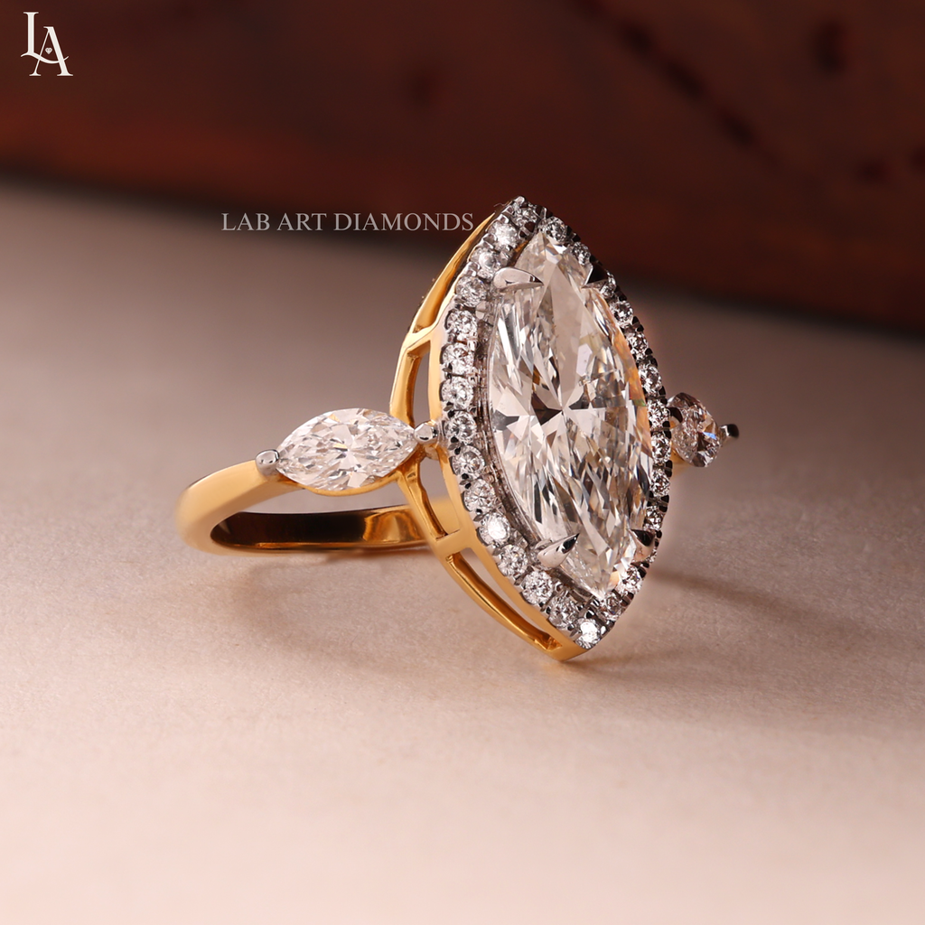 Marquise-Cut Three Stone Halo Engagement Ring