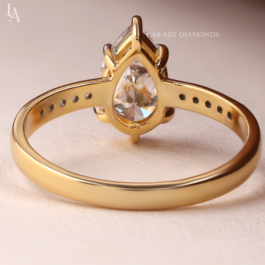 Pear Cut Tapered Pave Band Engagement Ring