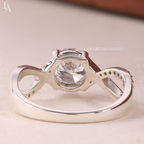 Round Cut Infinity Twist Engagement Ring