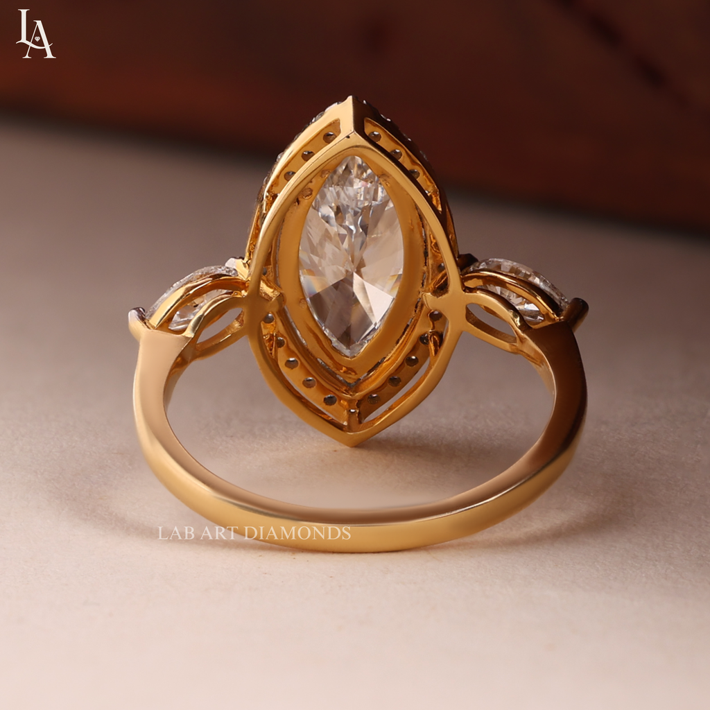 Marquise-Cut Three Stone Halo Engagement Ring