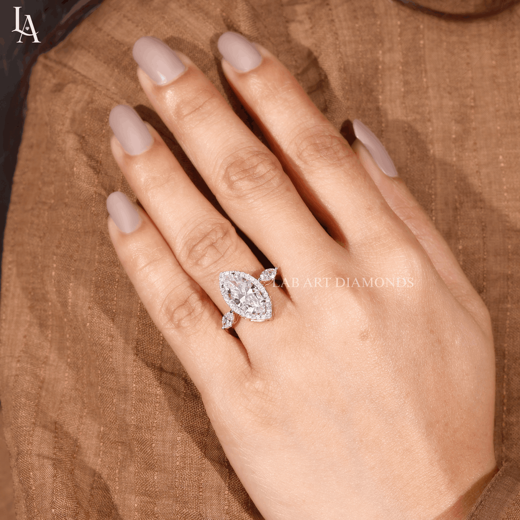 Marquise-Cut Three Stone Halo Engagement Ring