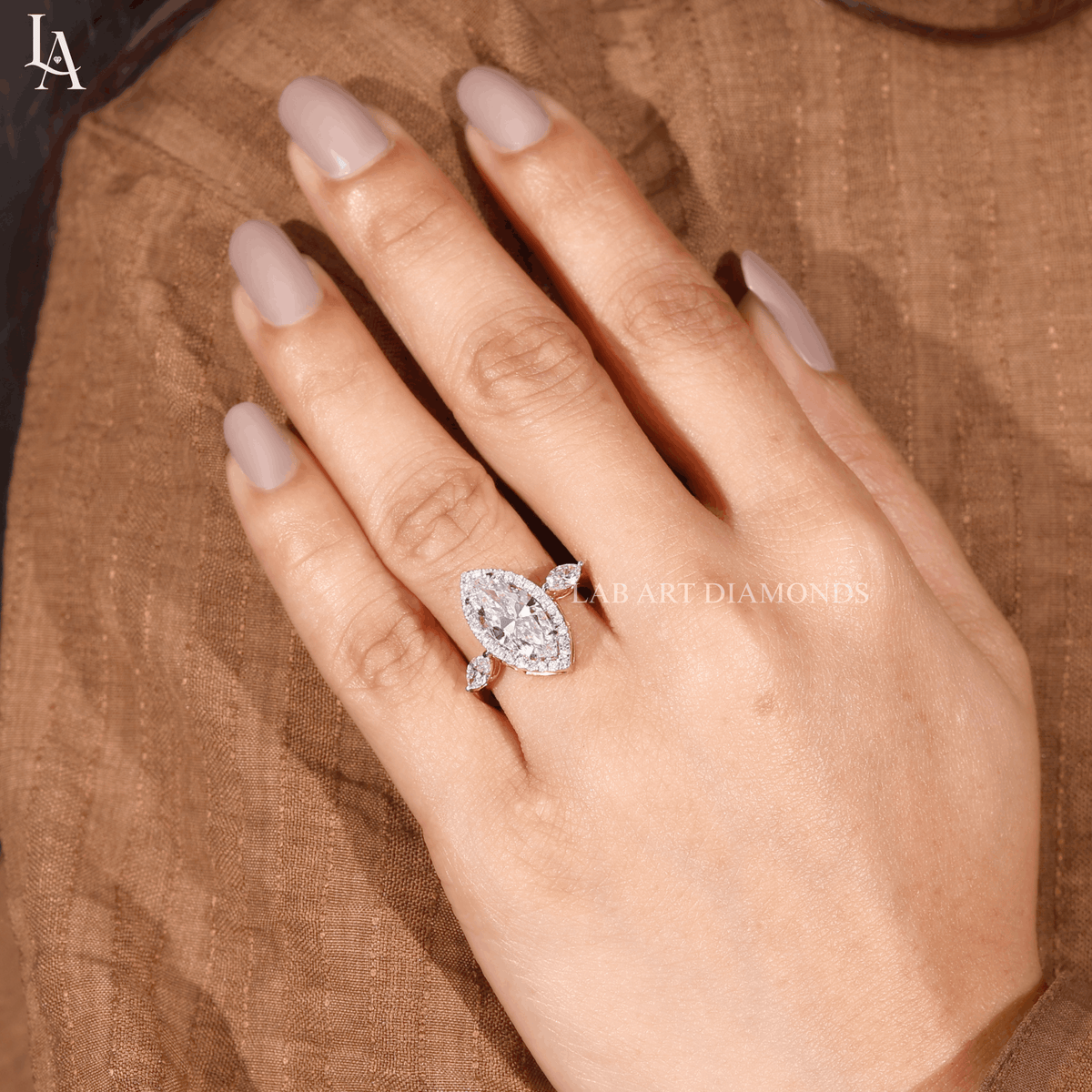Marquise-Cut Three Stone Halo Engagement Ring