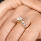 Round Cut Graduated Side Stone Engagement Ring