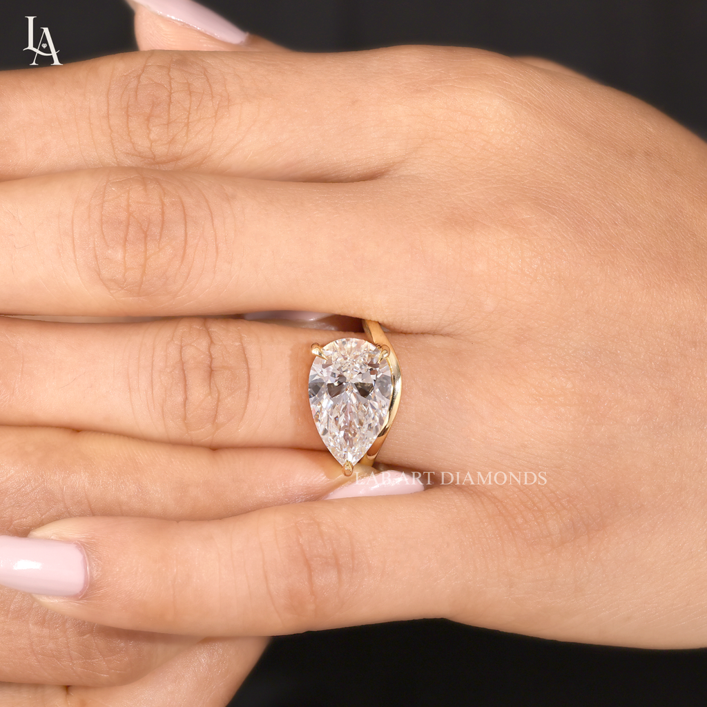East West Pear Cut Solitaire Engagement Ring
