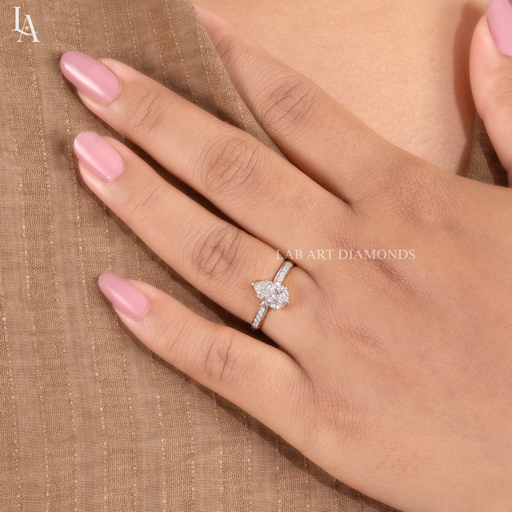 Pear Cut Tapered Pave Band Engagement Ring