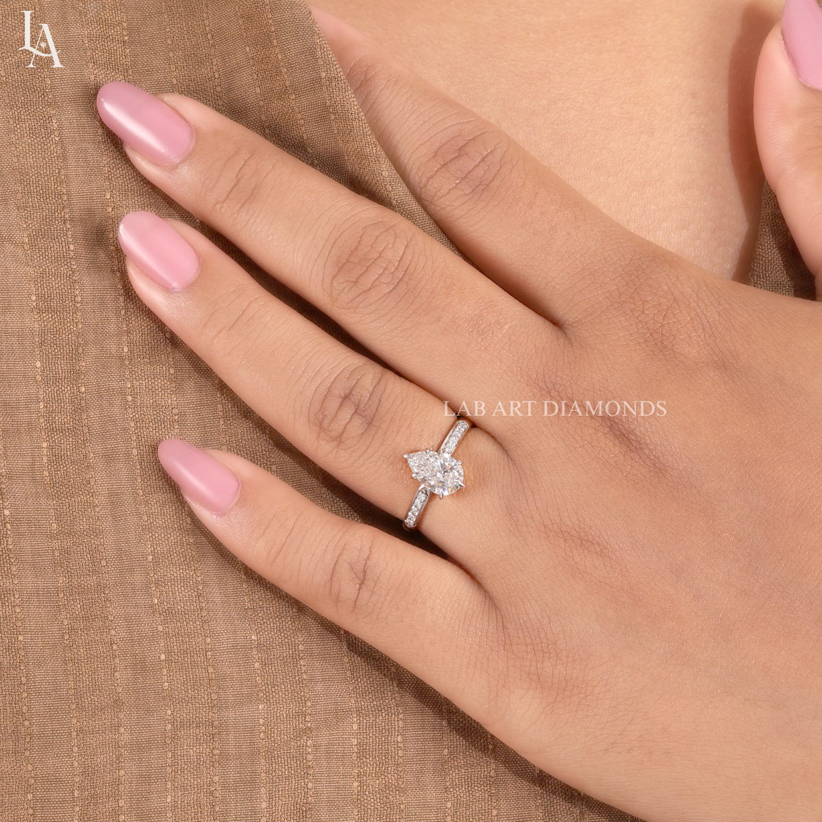 Pear Cut Tapered Pave Band Engagement Ring