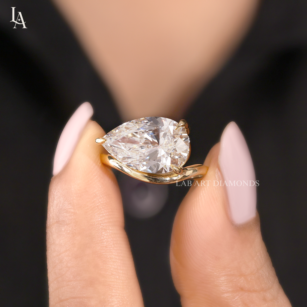 East West Pear Cut Solitaire Engagement Ring