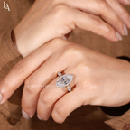 Marquise-Cut Three Stone Halo Engagement Ring