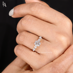 Round Cut Graduated Side Stone Engagement Ring