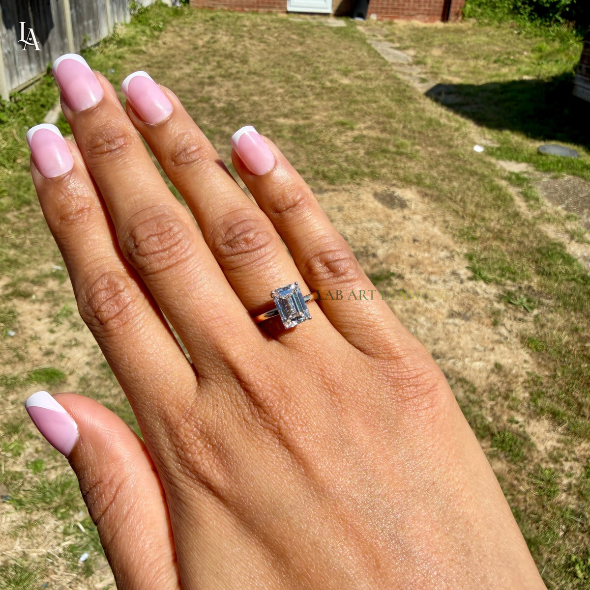 Emerald Cut Hidden Halo Engagement Ring