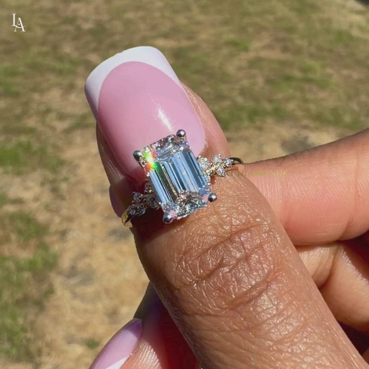 Emerald Cut Floral Side Stone Engagement Ring